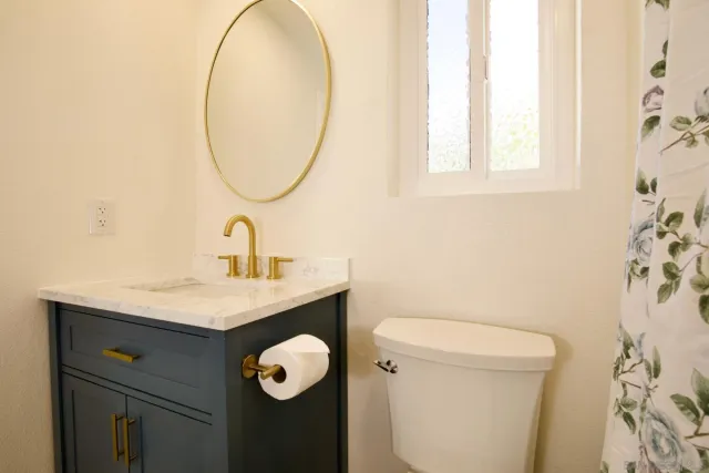 a bathroom with a bathtub and shower