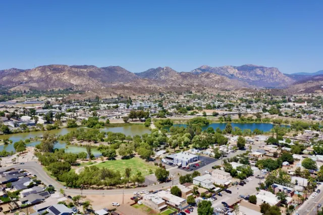 a view of a city with mountains in the background