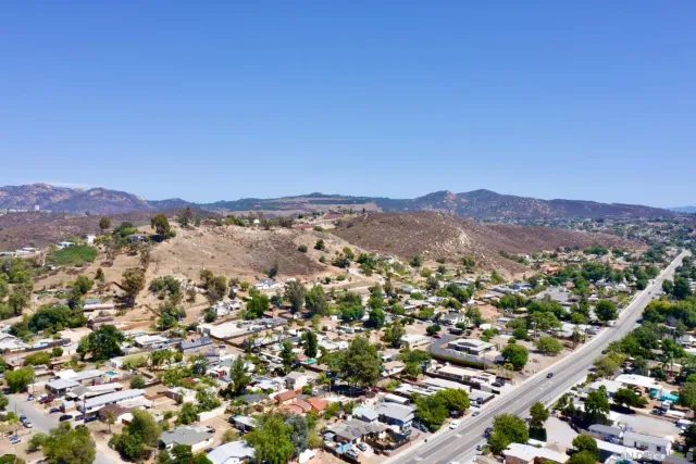 a view of a street with cars