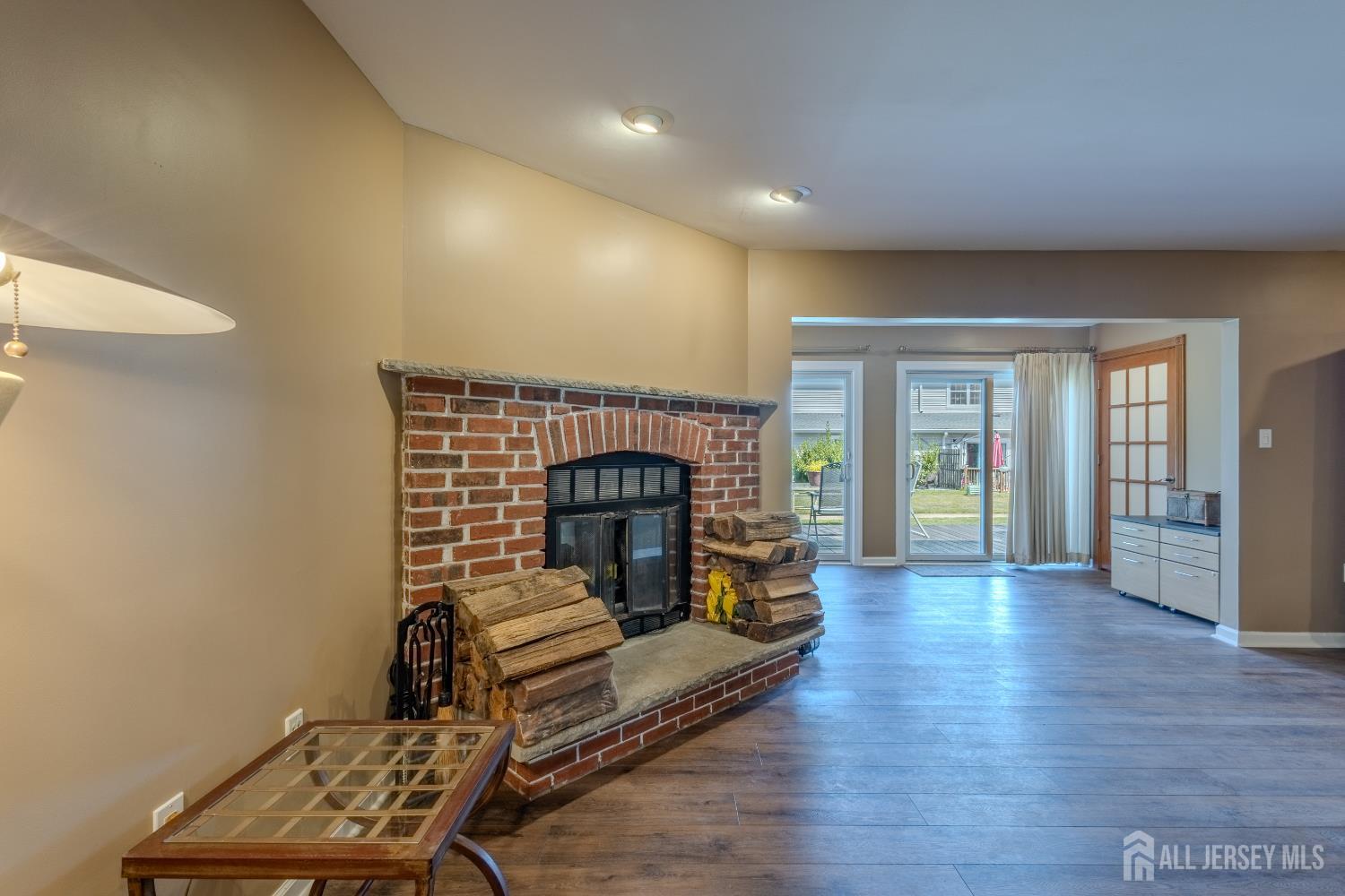 334 Constitution Circle North Brunswick, NJ 08902 - Photo 17 of 42 a living room with furniture and a fireplace