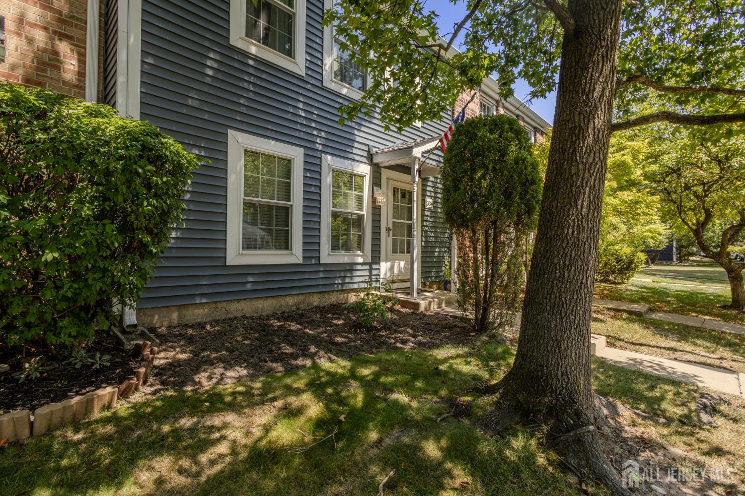 334 Constitution Circle North Brunswick, NJ 08902 - Photo 2 of 42 a view of a house with backyard and garden