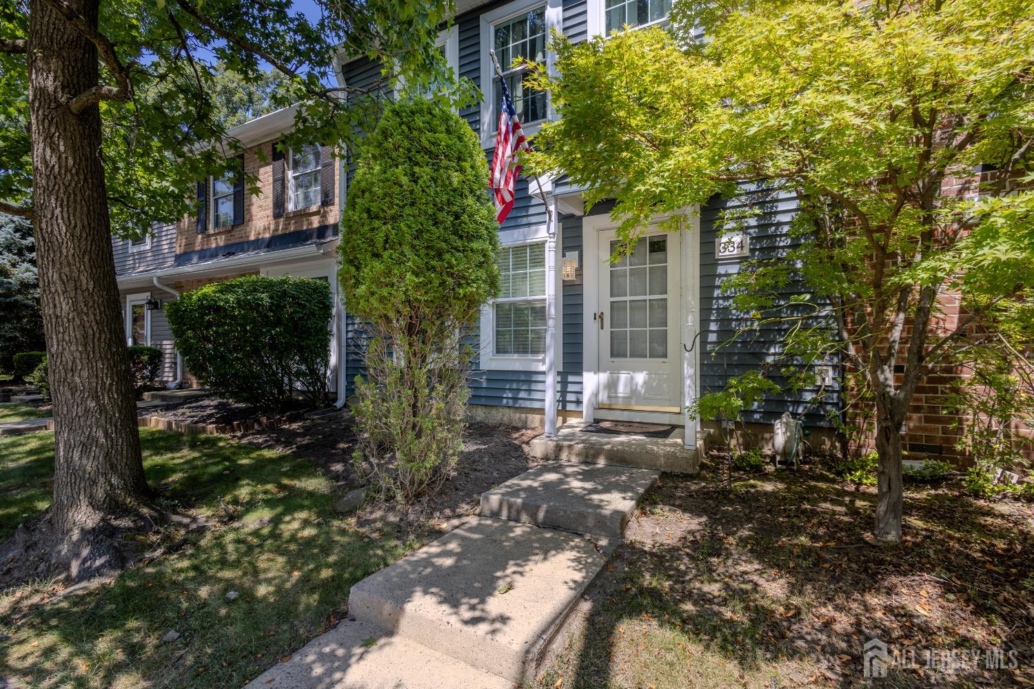 334 Constitution Circle North Brunswick, NJ 08902 - Photo 3 of 42 a view of a house with a tree