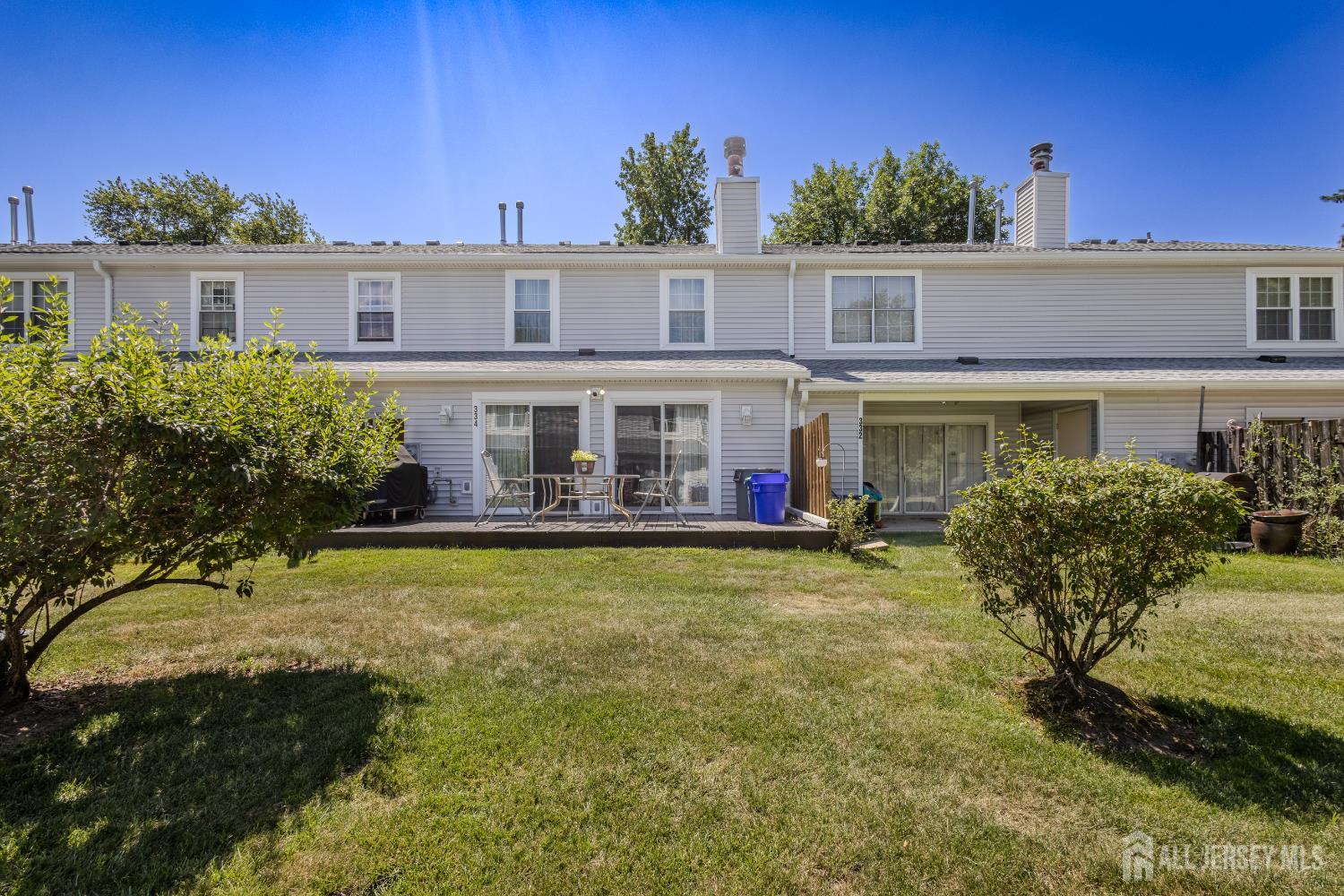 334 Constitution Circle North Brunswick, NJ 08902 - Photo 35 of 42 a view of a house with backyard porch and sitting area