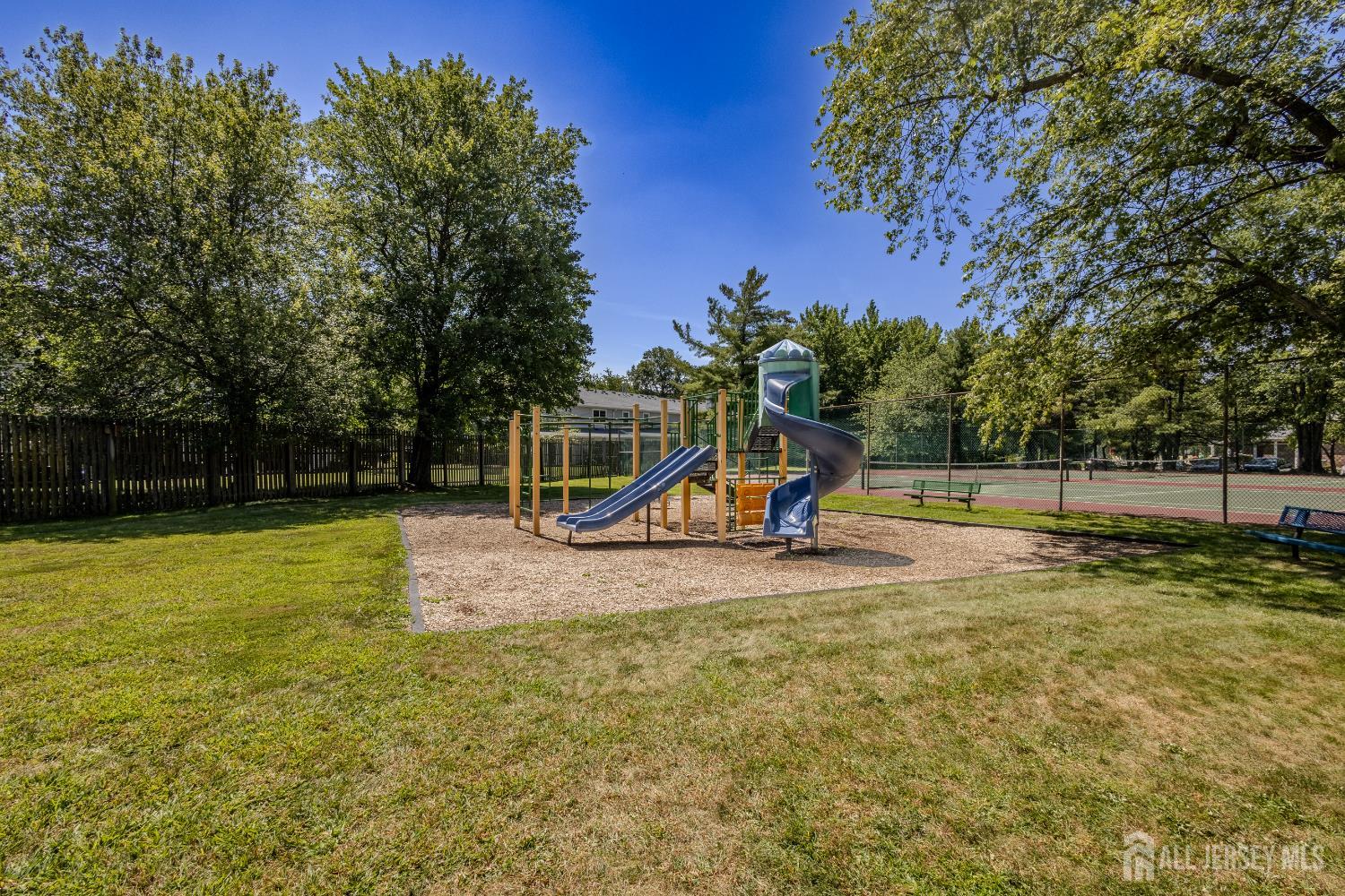 334 Constitution Circle North Brunswick, NJ 08902 - Photo 42 of 42 a view of a playground with a slide