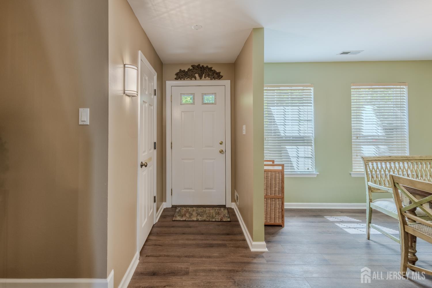 334 Constitution Circle North Brunswick, NJ 08902 - Photo 5 of 42 a view of a hallway with wooden floor and windows