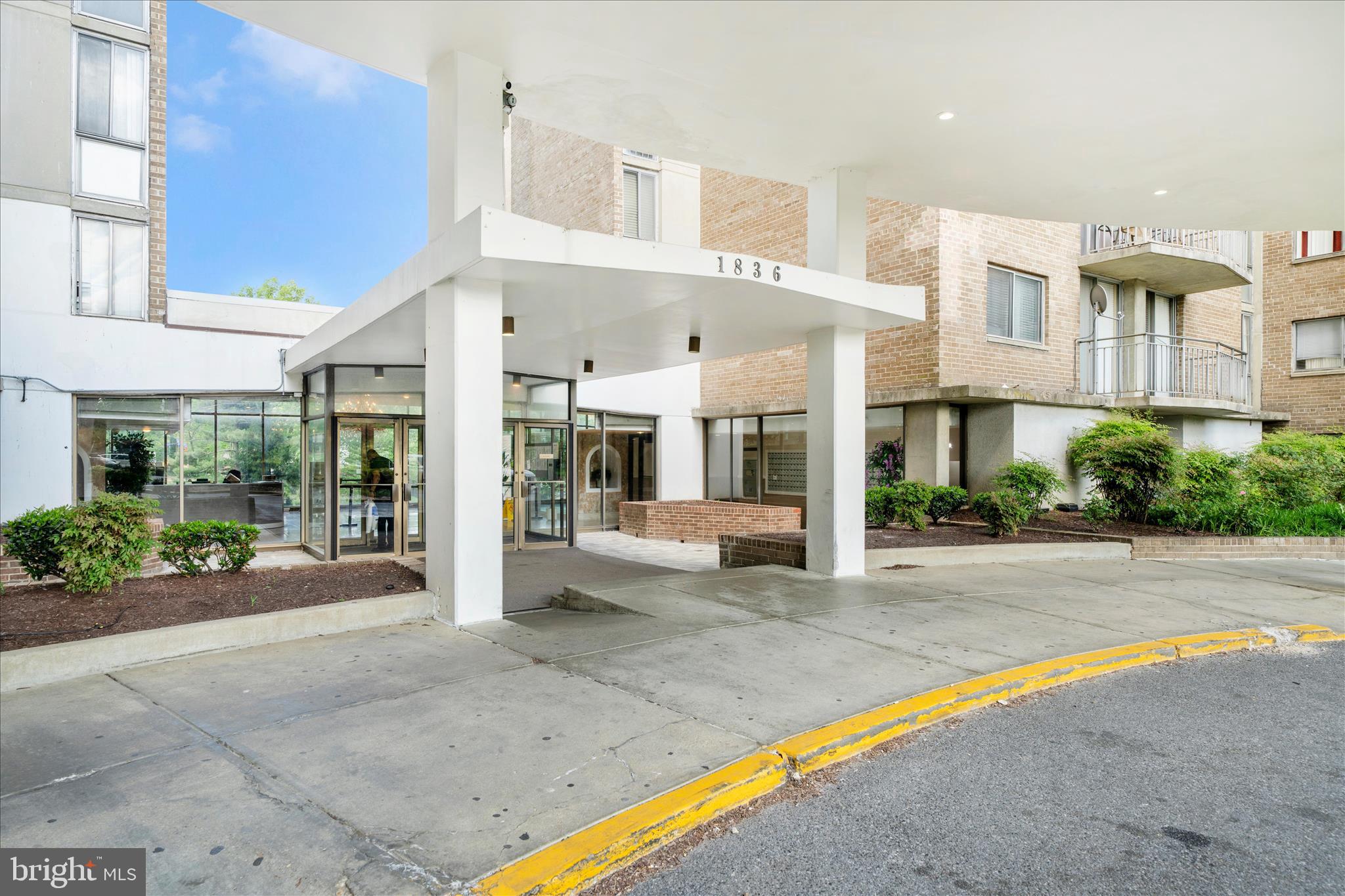 1836 Metzerott Road, Unit 904 Hyattsville, MD 20783 - Photo 35 of 37 a view of a building with a patio
