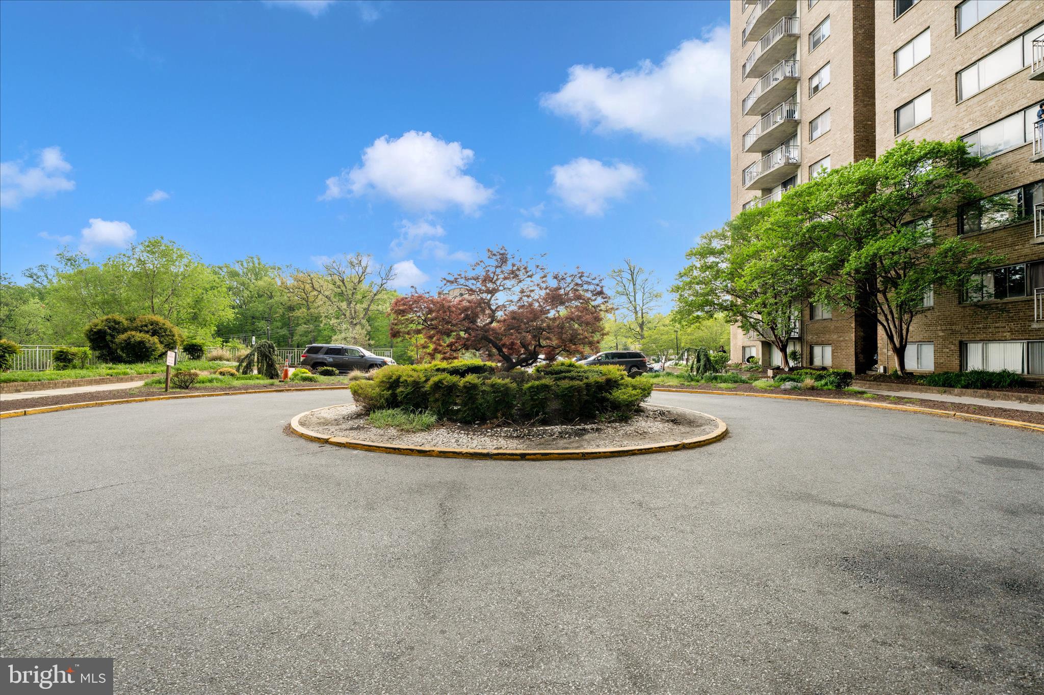 1836 Metzerott Road, Unit 904 Hyattsville, MD 20783 - Photo 36 of 37 a view of a house with a yard