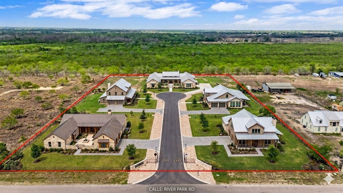 1310 River Park Road Luling, TX 78648 - Photo 2 of 9 an aerial view of a house with a garden