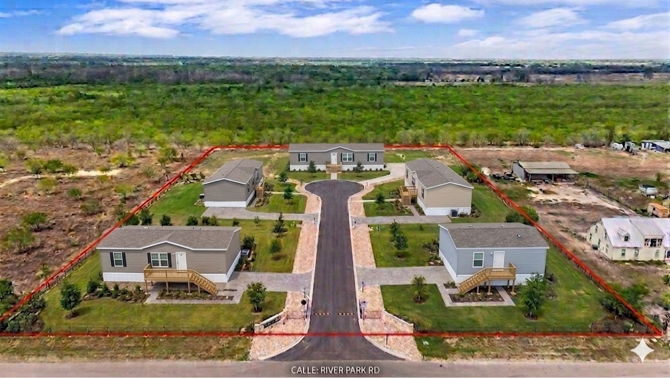 1310 River Park Road Luling, TX 78648 - Photo 3 of 9 an aerial view of a house with a garden