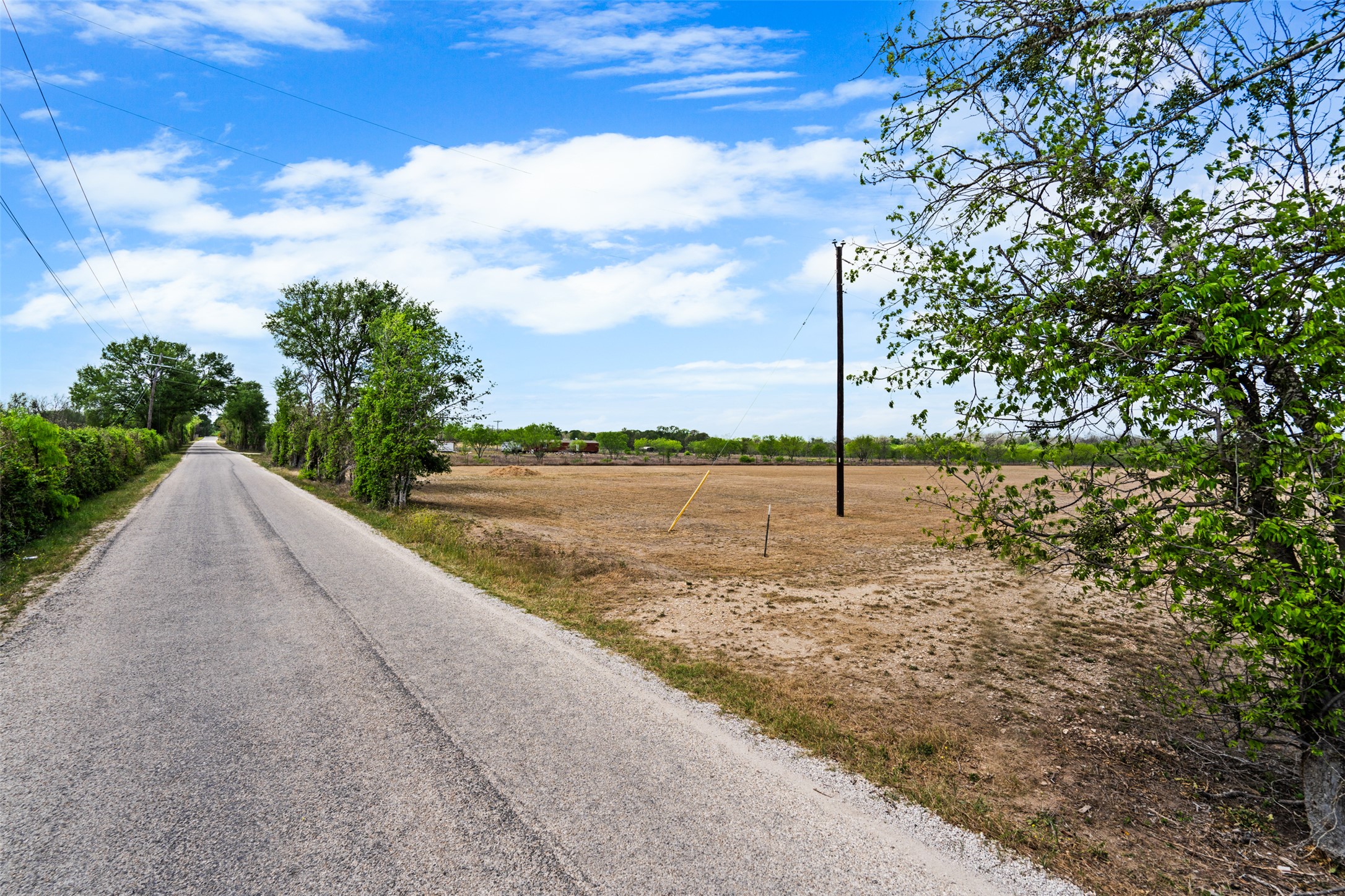 1310 River Park Road Luling, TX 78648 - Photo 6 of 9 a view of a lake with a big yard