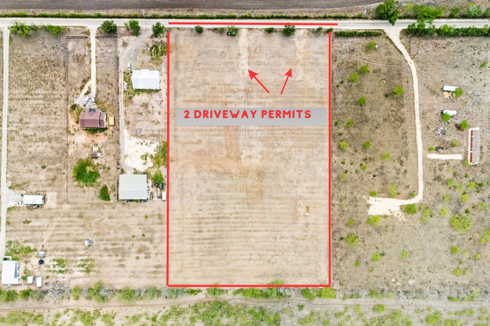 1310 River Park Road Luling, TX 78648 - Photo 7 of 7 Aerial view of sparsely populated area featuring a desert landscape and property boundaries highlighted