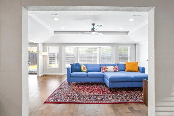 a kitchen with a stove a sink and a microwave