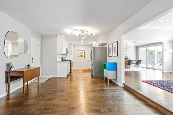 a bedroom with furniture and a fireplace