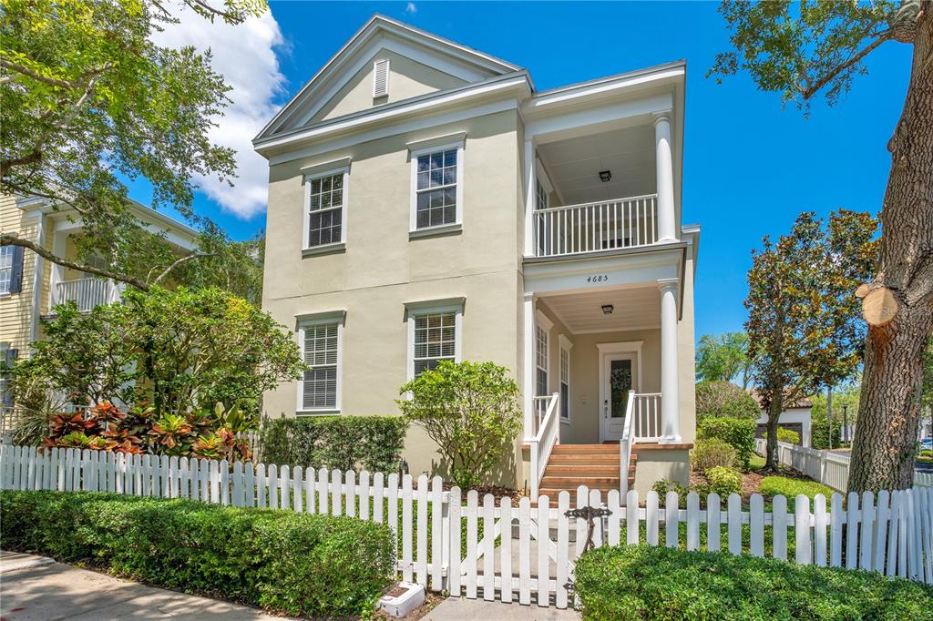 4685 Anson Lane Orlando, FL 32814 - Photo 1 of 1 a front view of a house with a garden