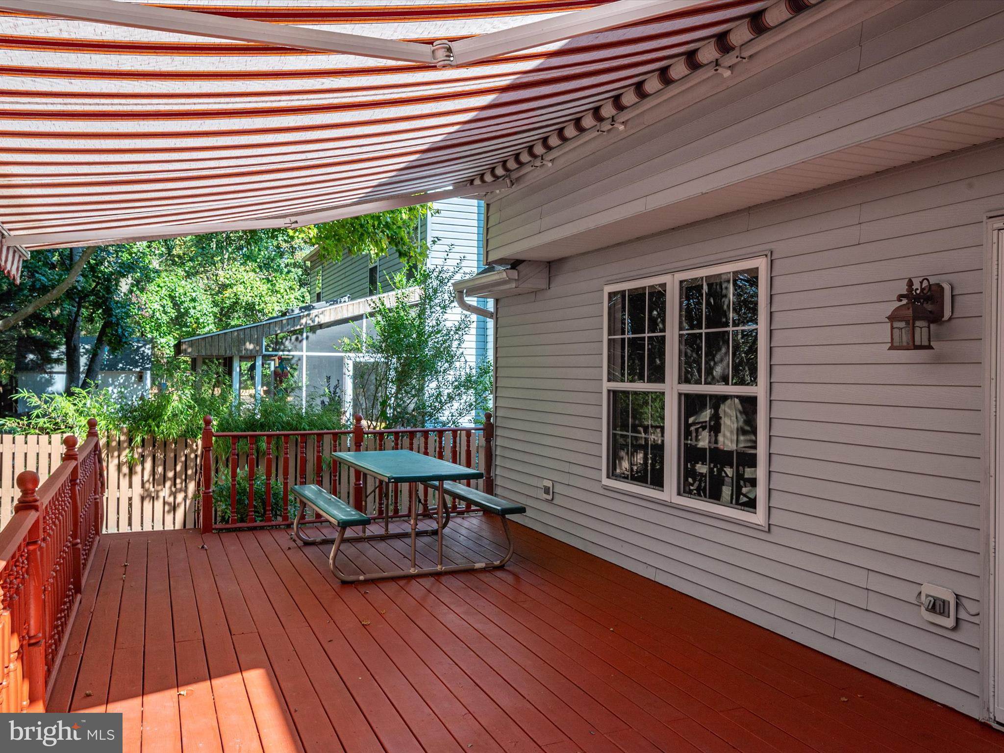 1202 Jewel Weed Path Pasadena, MD 21122 - Photo 7 of 47 Perfect for entertaining with awning