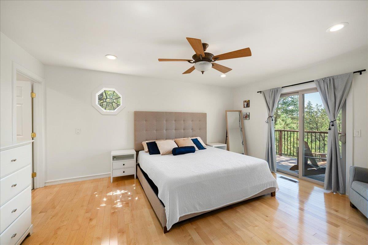 3560 Sugar View Road Meadow Vista, CA 95722 - Photo 13 of 49 Main Floor Primary EnSuite with Patio Access, Walk-In Closet w/South Carolina Cedar Flooring