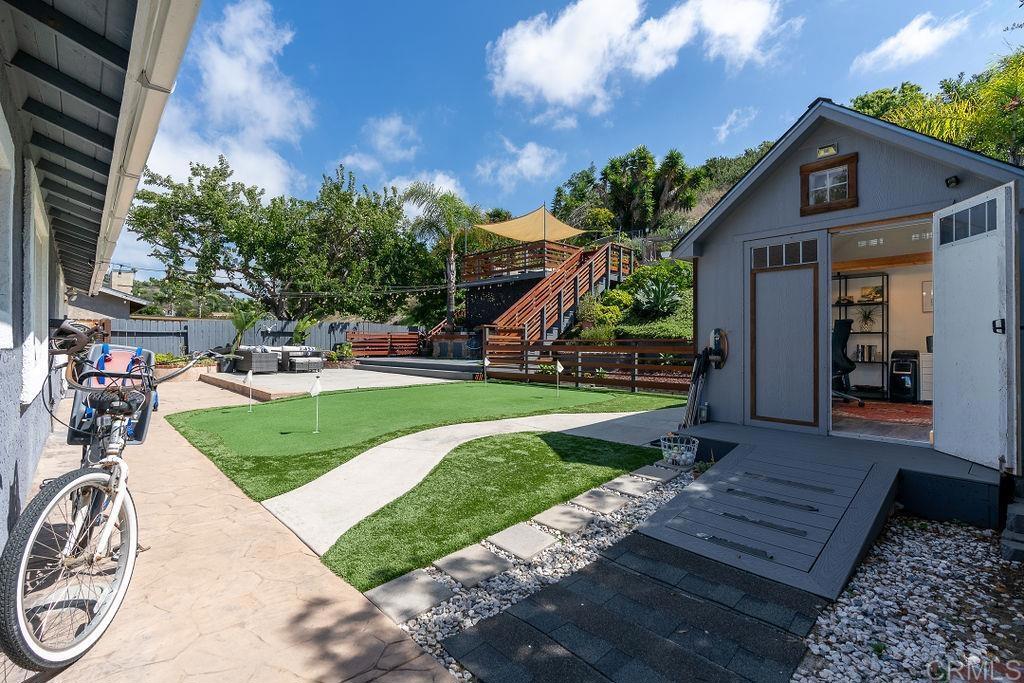 3765 Cameo Drive Oceanside, CA 92056 - Photo 23 of 37 a front view of a house with a yard