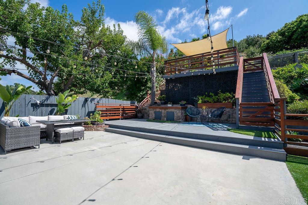 3765 Cameo Drive Oceanside, CA 92056 - Photo 27 of 37 a view of the house with backyard and sitting area