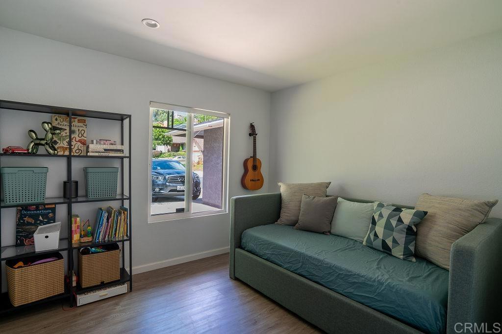 3765 Cameo Drive Oceanside, CA 92056 - Photo 10 of 37 a living room with furniture and a flat screen tv
