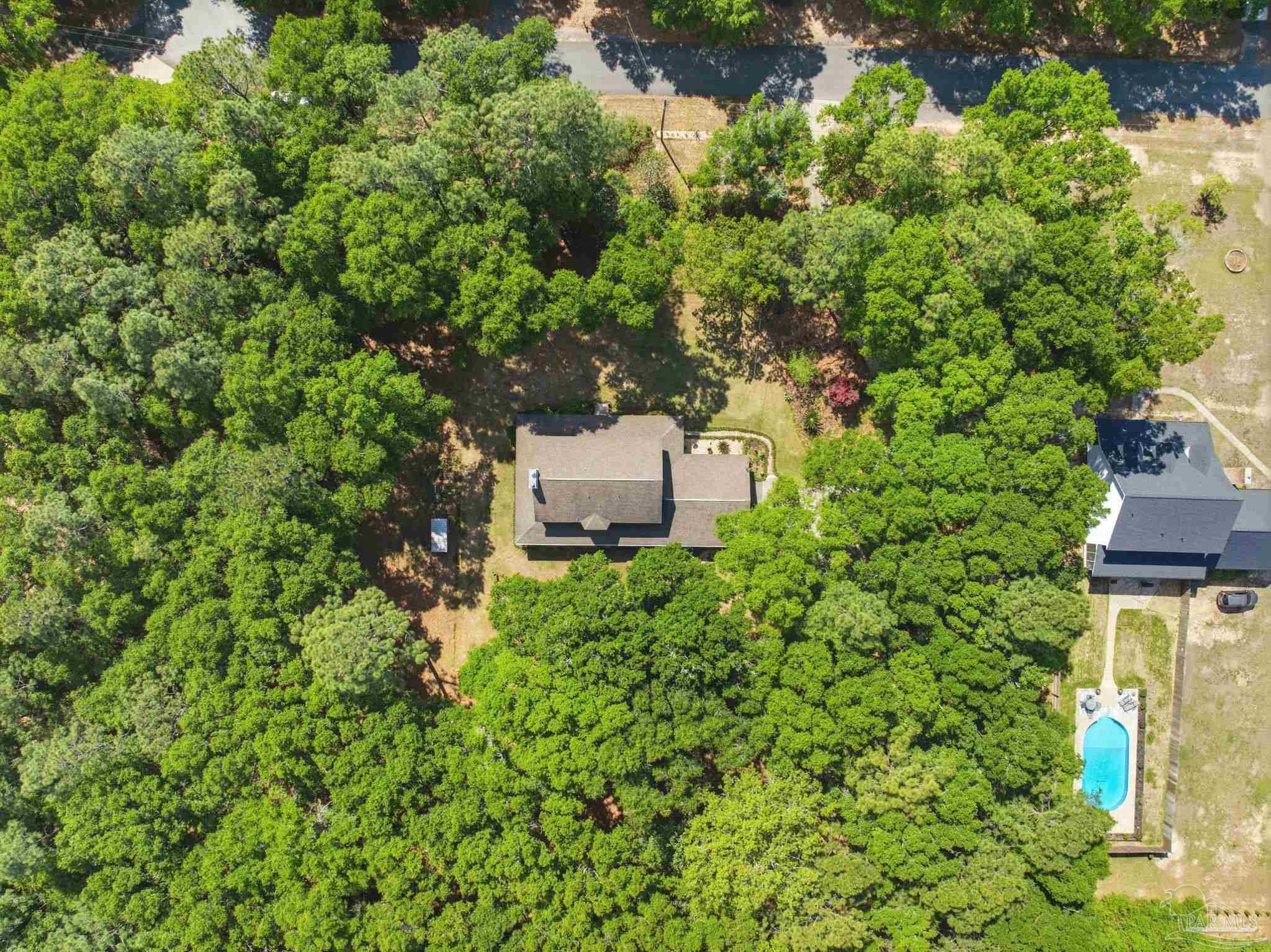 6930 Summit Way Milton, FL 32570 - Photo 59 of 71 an aerial view of a house with a yard
