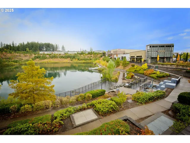 a view of a park with swings and slides