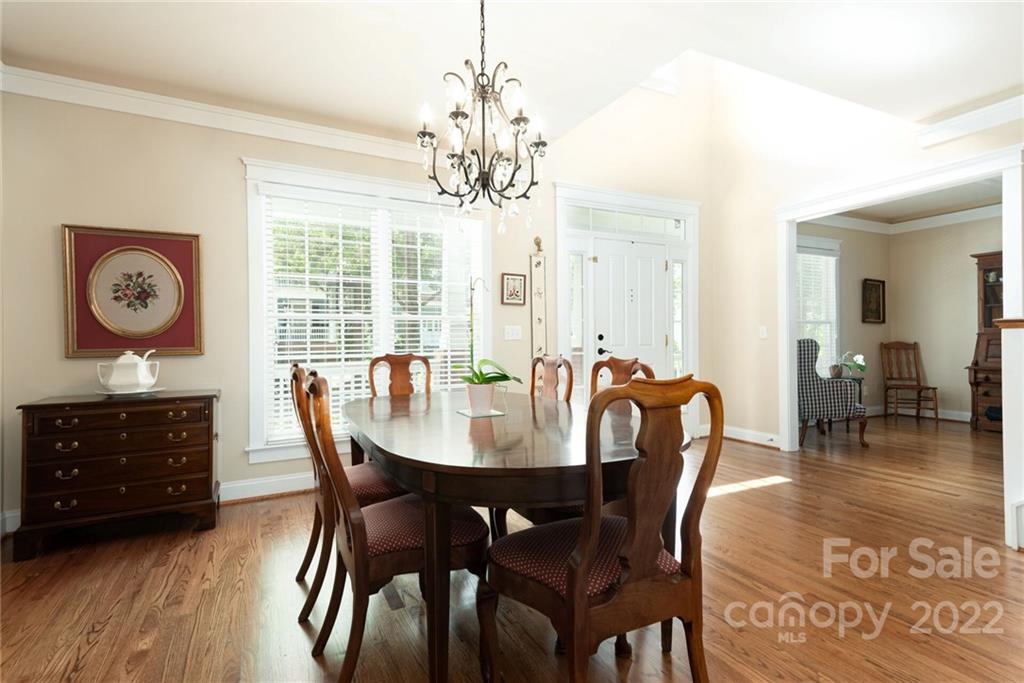 1860 2nd Baxter Crossing Fort Mill, SC 29708 - Photo 9 of 37 a view of a dining room with furniture window and wooden floor