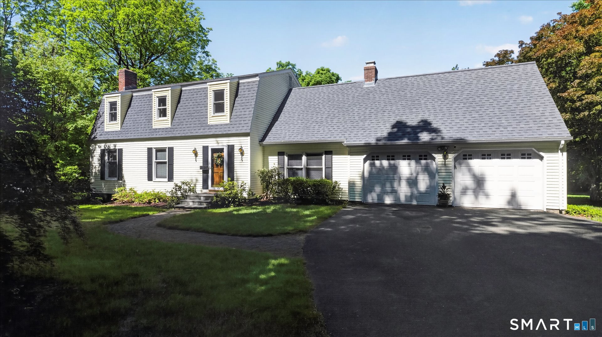 5 Shingle Mill Drive Canton, CT 06019 - Photo 2 of 38 a front view of a house with garden