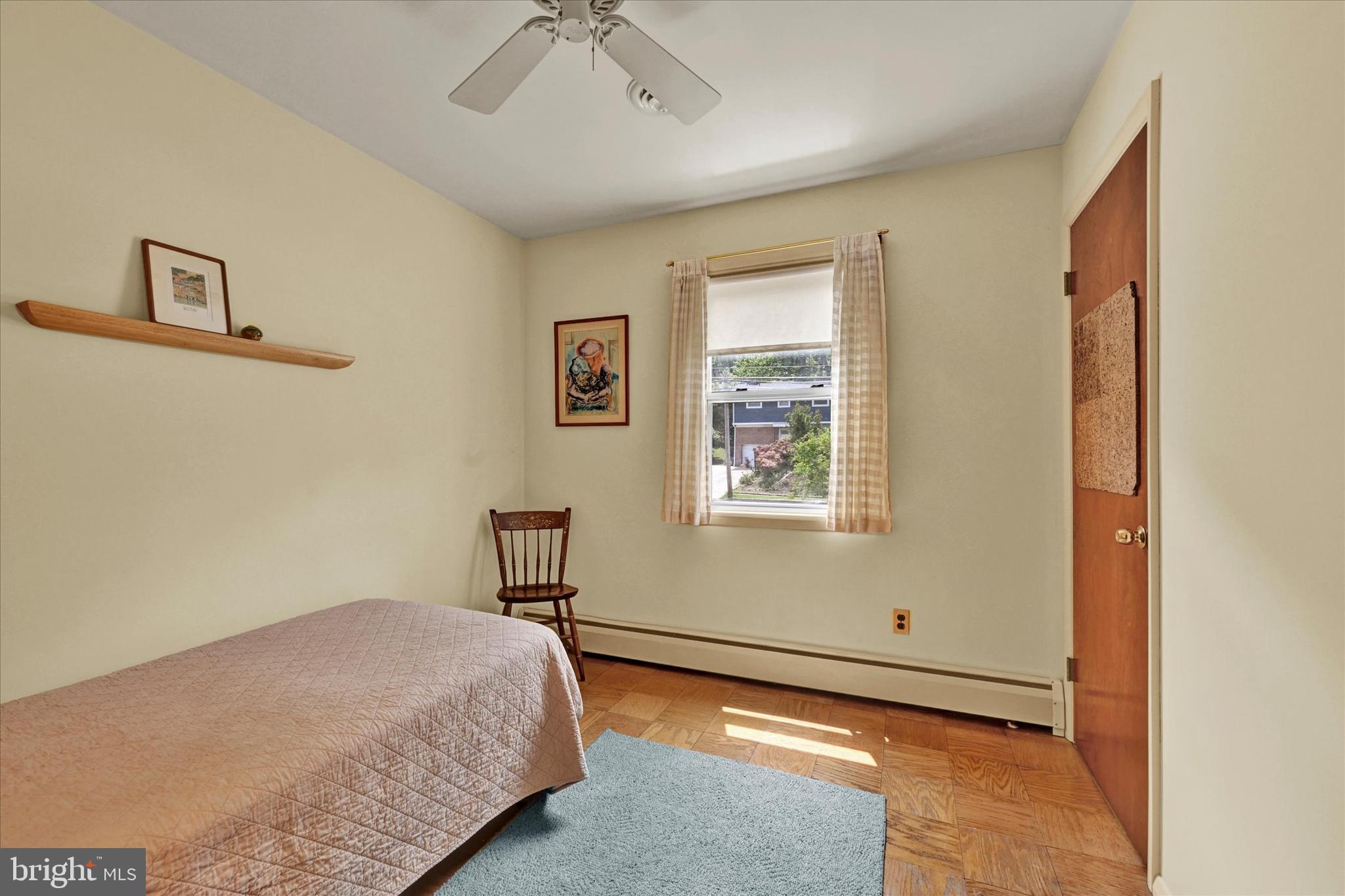 920 Cromwell Bridge Road Towson, MD 21286 - Photo 17 of 28 Bedroom 3 with Hardwood Flooring & Ceiling Fan
