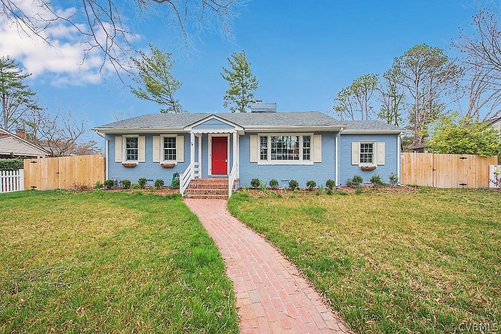 8008 Dunsmore Road Henrico, VA 23229 - Photo 1 of 46 front view of a house with a yard
