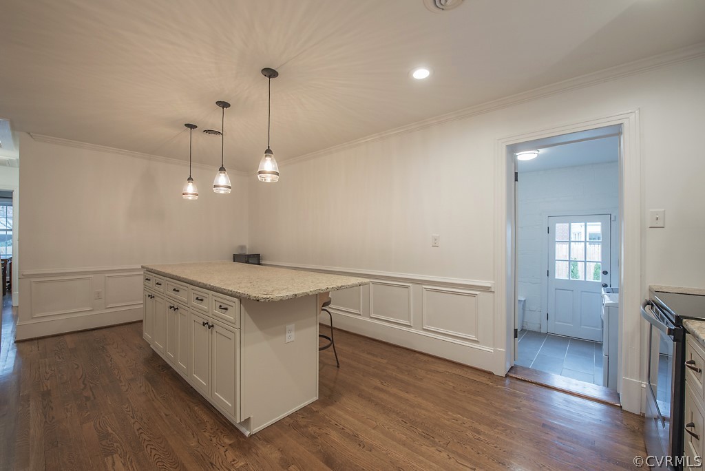 8008 Dunsmore Road Henrico, VA 23229 - Photo 21 of 46 a view of cabinets and wooden floor