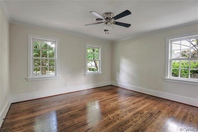 8008 Dunsmore Road Henrico, VA 23229 - Photo 36 of 46 a view of an empty room with wooden floor and a window