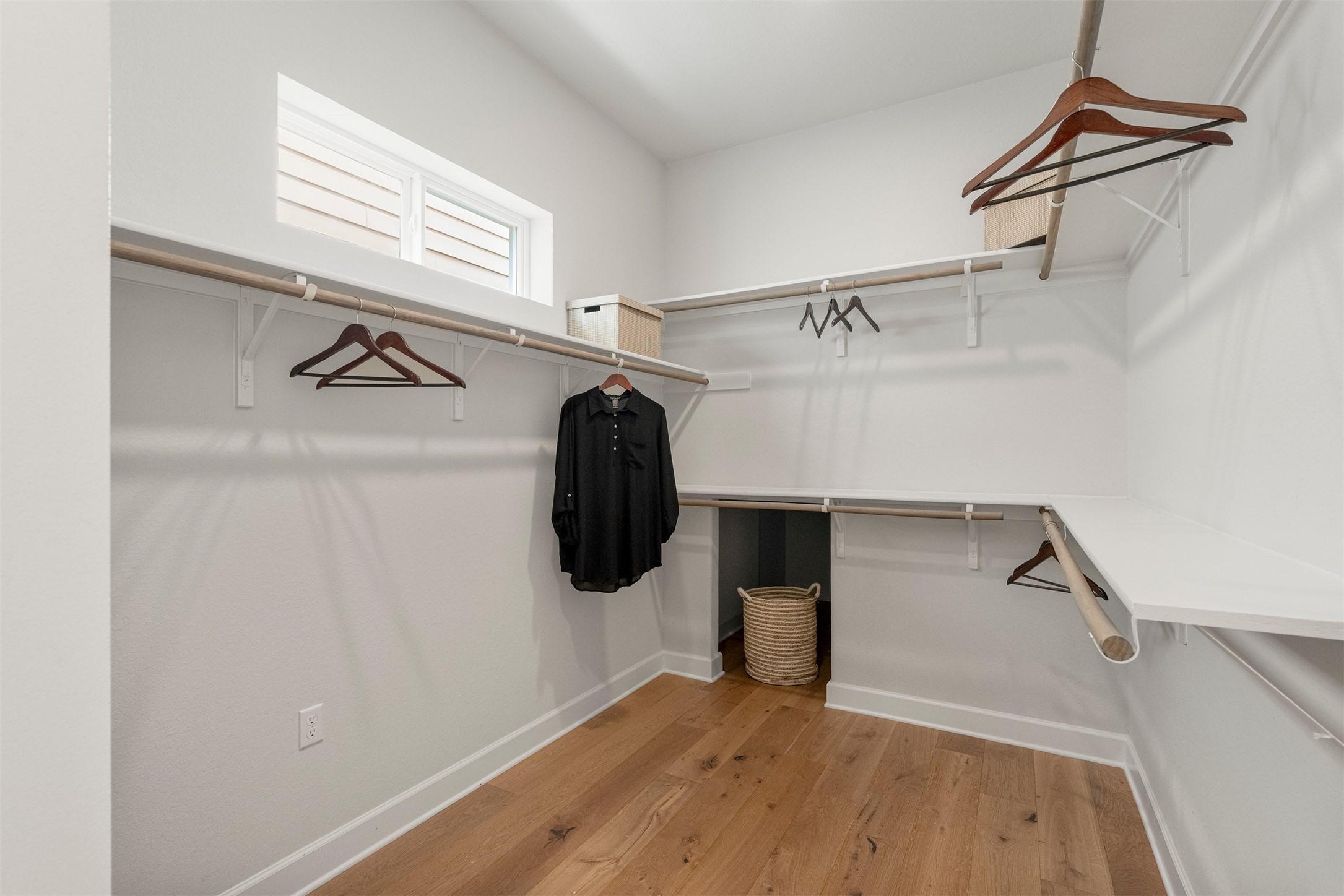4313 Vaughan Street Austin, TX 78723 - Photo 25 of 39 The primary bathroom leads into a deep walk-in closet with abundant storage space for wardrobes of any size