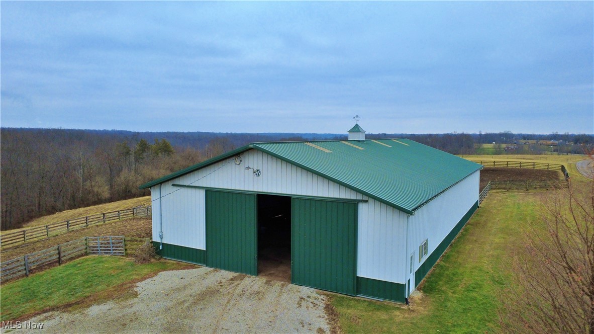 2242 South McCoy Ridge Road Stockport, OH 43787 - Photo 24 of 41 View of pole building featuring a rural view