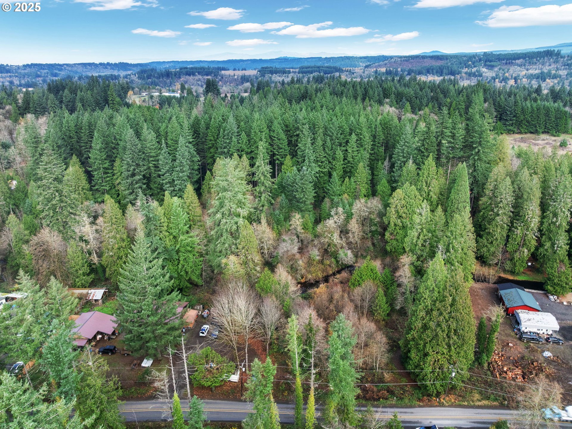 Coalman Road Sandy, OR 97055 - Photo 16 of 23 a view of a city with lush green forest
