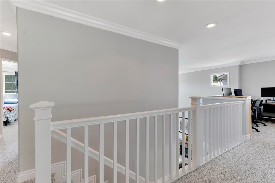 2702 Titania Place Simi Valley, CA 93063 - Photo 17 of 38 a view of a hallway with workspace