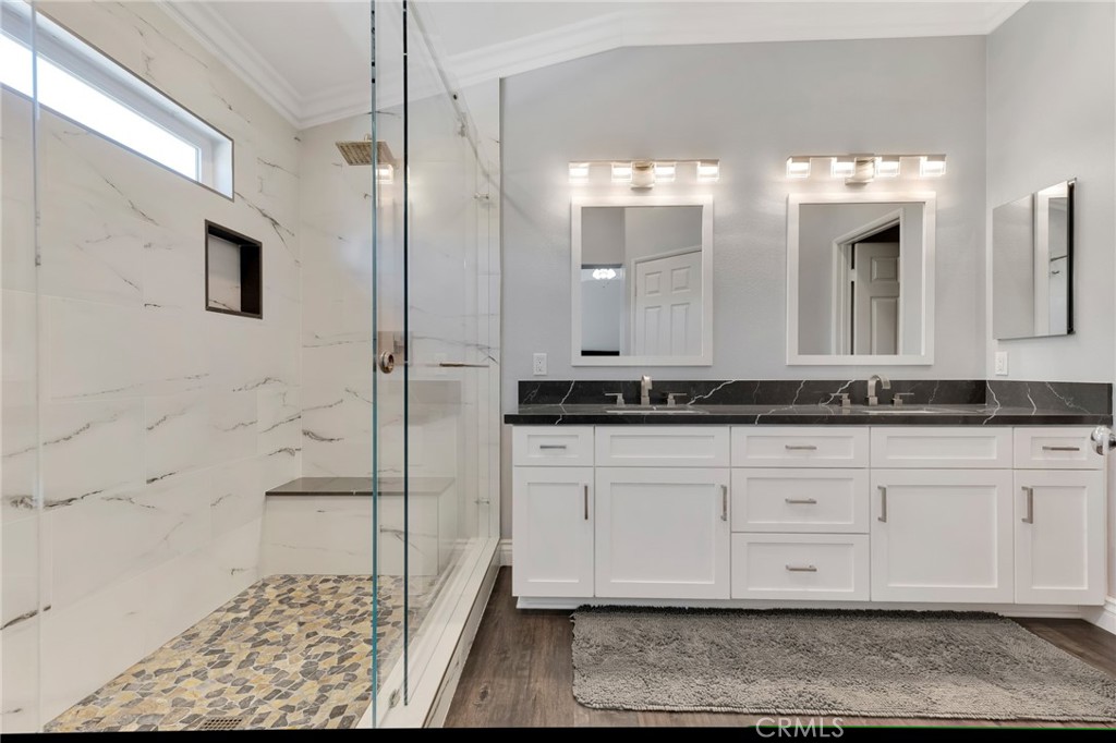 2702 Titania Place Simi Valley, CA 93063 - Photo 27 of 38 a bathroom with a sink and a mirror
