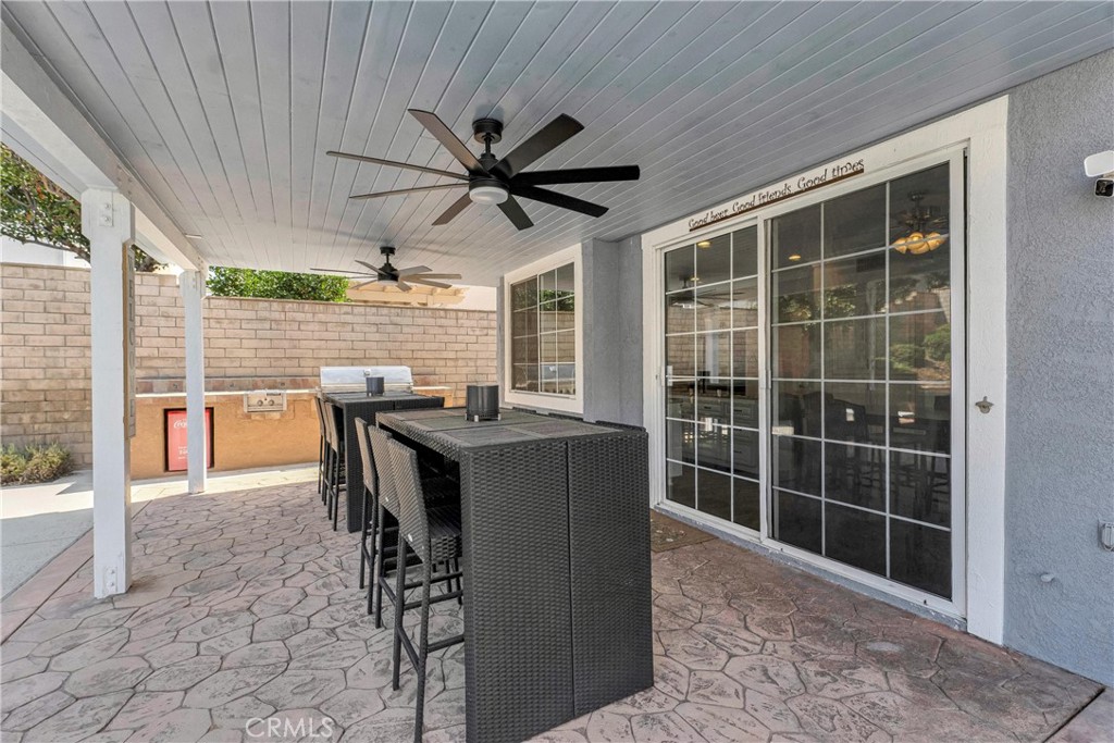 2702 Titania Place Simi Valley, CA 93063 - Photo 29 of 38 a view of a porch with furniture and a yard