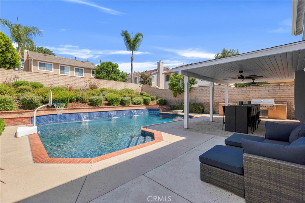 2702 Titania Place Simi Valley, CA 93063 - Photo 32 of 38 a view of swimming pool with outdoor seating and a patio