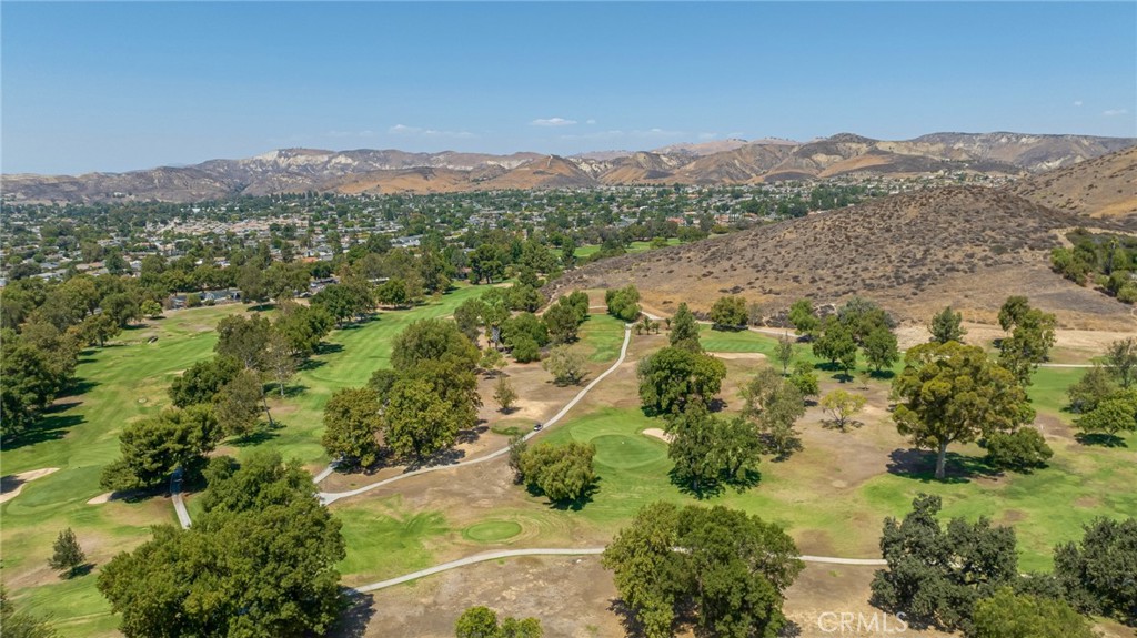 2702 Titania Place Simi Valley, CA 93063 - Photo 38 of 38 a view of a city with mountains in the background
