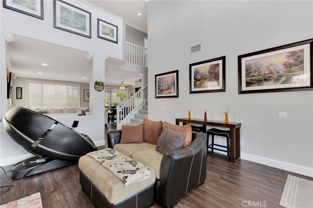 2702 Titania Place Simi Valley, CA 93063 - Photo 4 of 38 a living room with furniture and wooden floor