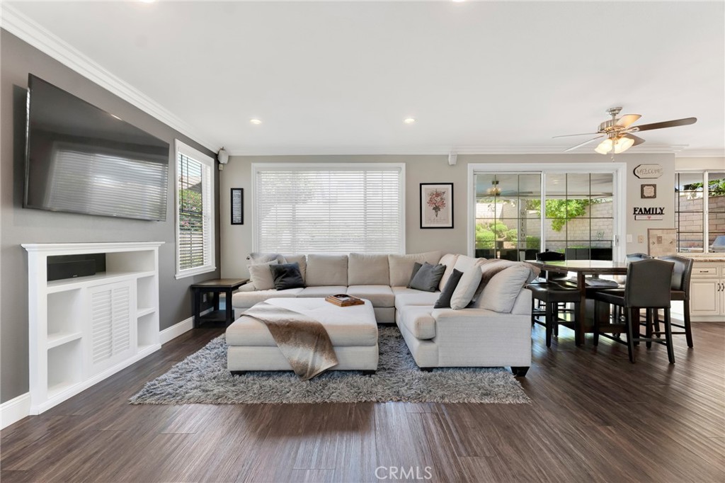 2702 Titania Place Simi Valley, CA 93063 - Photo 8 of 38 a living room with furniture and a wooden floor
