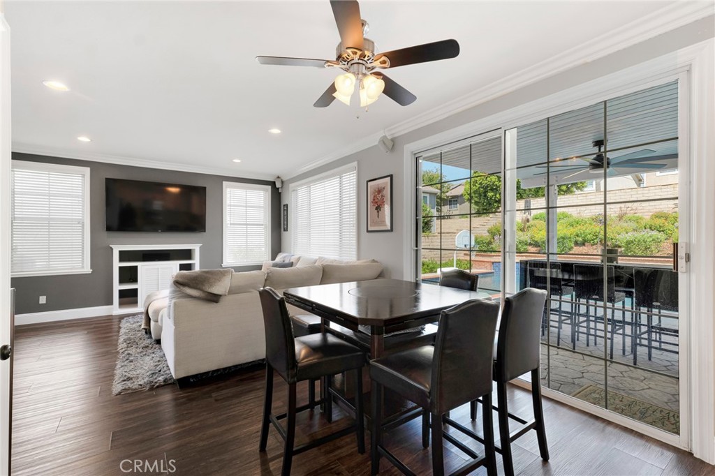 2702 Titania Place Simi Valley, CA 93063 - Photo 9 of 38 a view of a dining room with furniture window and wooden floor