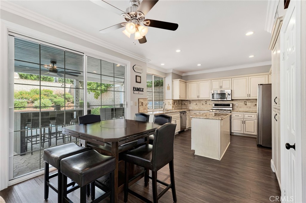 2702 Titania Place Simi Valley, CA 93063 - Photo 10 of 38 a dining room with furniture and window