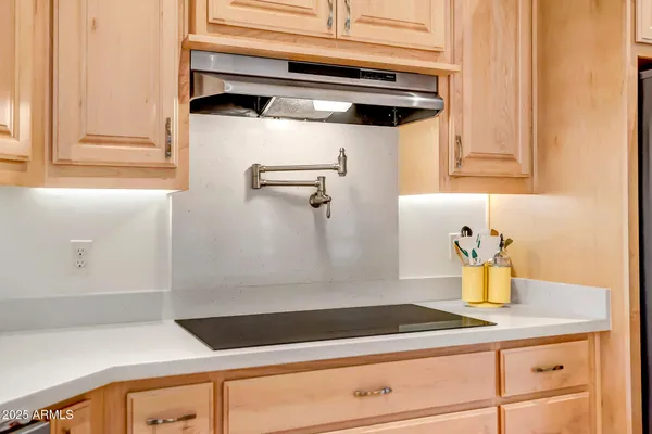 a bathroom with a sink and mirror