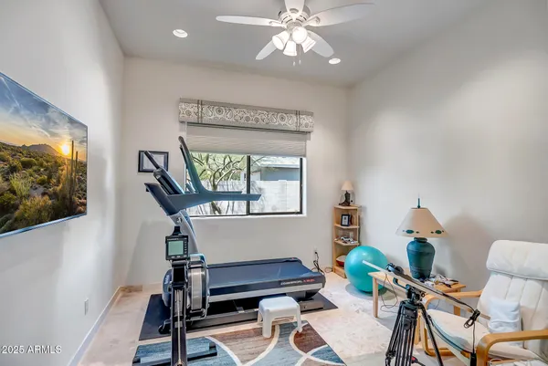 a workspace with furniture and window