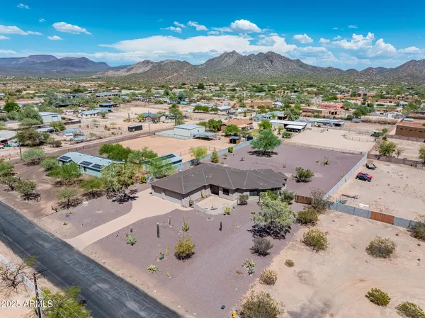 an aerial view of a house with a garden