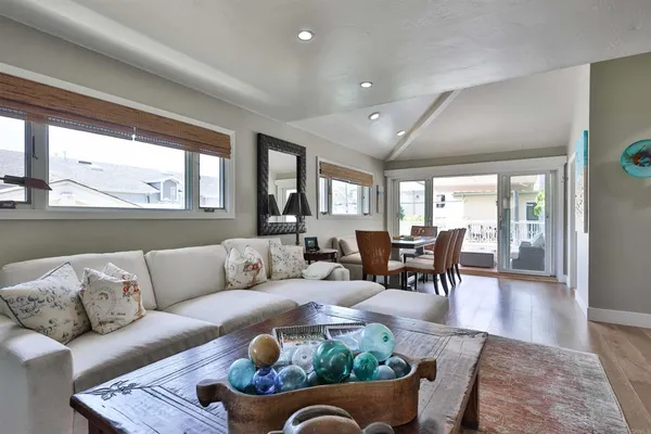 a kitchen with stainless steel appliances granite countertop a sink and cabinets