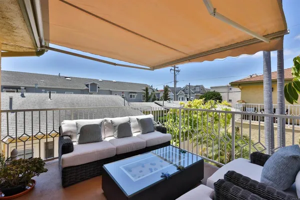 a view of a living room and a couch