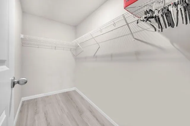 a view of a room with racks on the wall