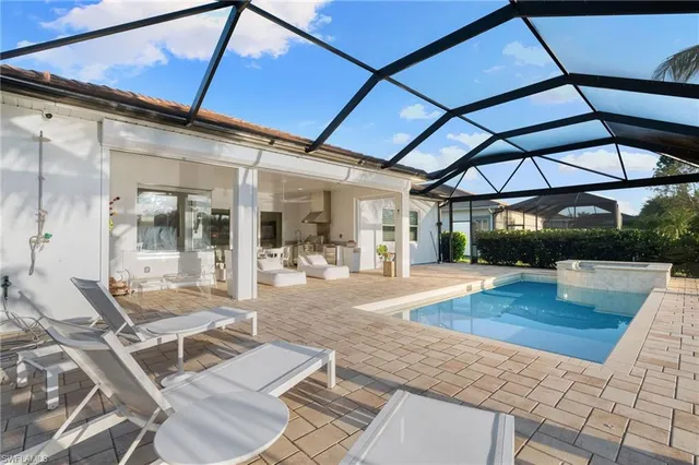 a view of a backyard of a house